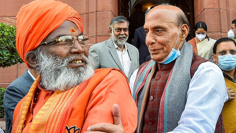 Union Defence Minister Rajnath Singh (R) and BJP MP Sakshi Maharaj. Credit: PTI Photo