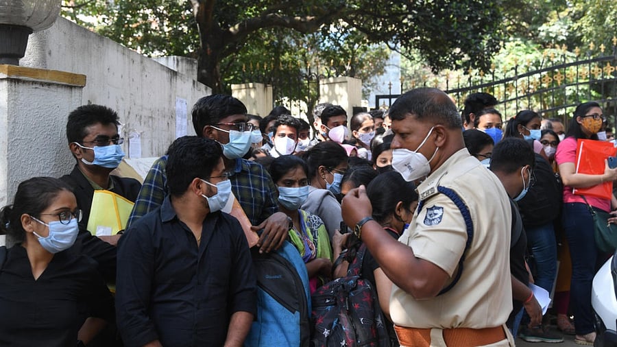 Seat aspirants gather for document scrutiny  in front of the CET cell at Malleswaram in Bengaluru on Monday. Credit: DH Photo/B H Shivakumar