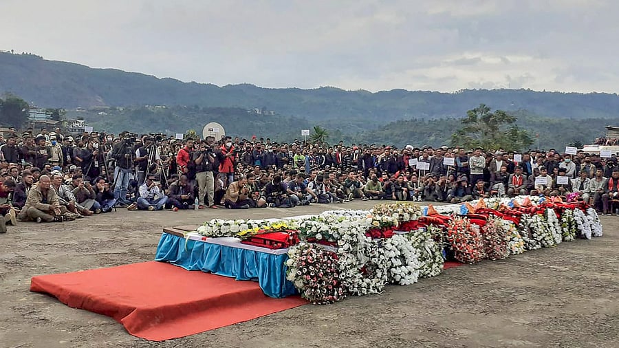 The coffins of 13 civilians who were gunned down. Credit: PTI Photo