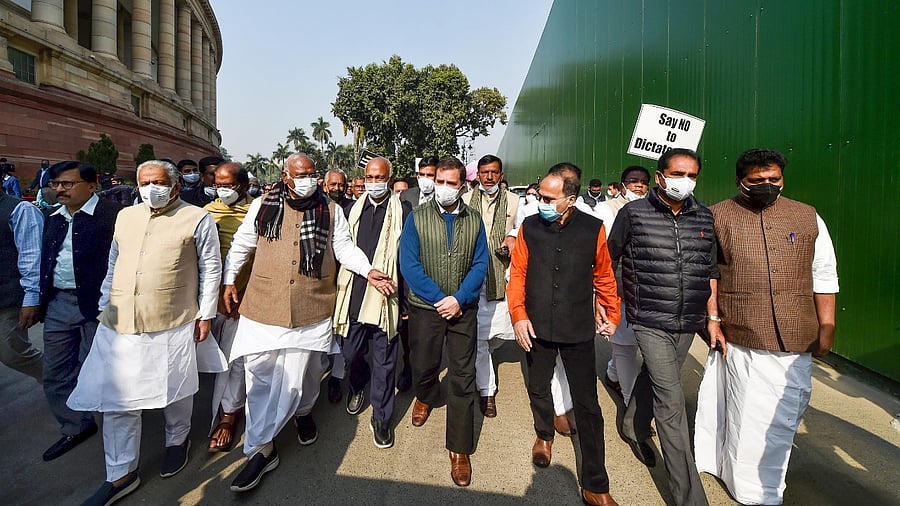 Rahul Gandhi with other opposition leaders during a protest march from Gandhi statue in Parliament premises to Vijay Chowk. Credit: PTI Photo
