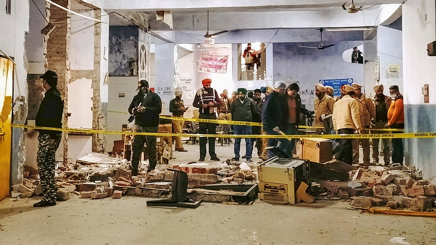 Security personnel at the site after an explosion at the Ludhiana district court complex, Thursday, December 23, 2021. Credit: PTI Photo
