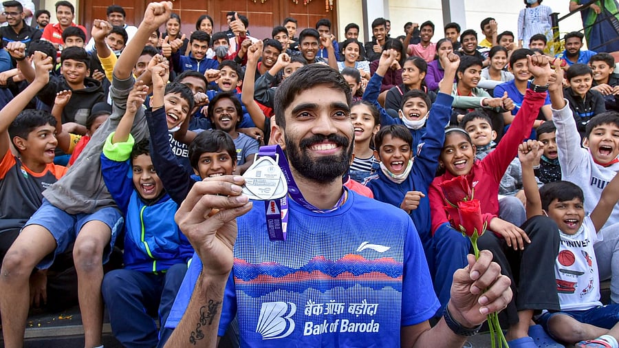 Kidambi Srikanth displays his silver medal from the World Championships in Spain this year. Credit: PTI Photo