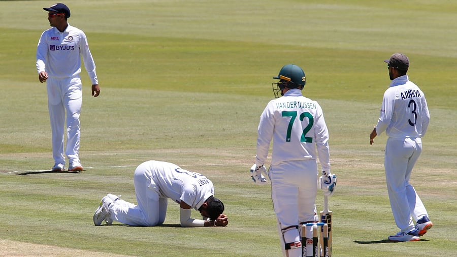Jasprit Bumrah reacts after sustaining an injury. Credit: Reuters Photo