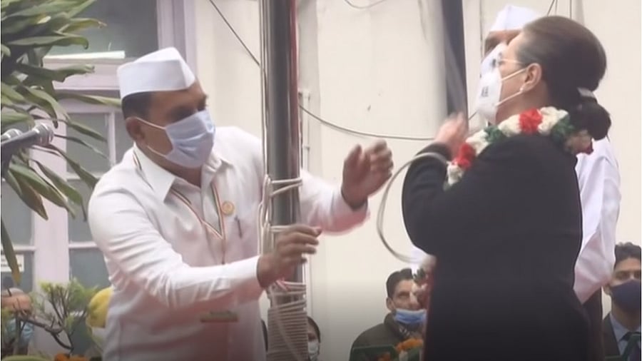 Incidentally, Congress managers had put up a higher steel flagpole instead of a shorter one usually seen at the party headquarters. Credit: ANI Screengrab