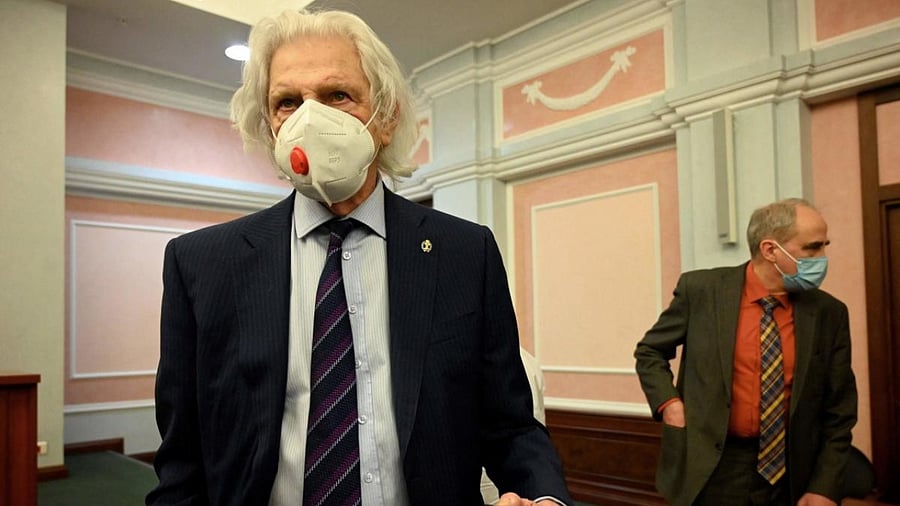 Lawyer Genry Reznik (L) of Memorial International rights group leaves the court room, in Moscow on December 28, 2021, after Russia's Supreme Court orders the closure of Memorial International, the organisation's central structure, over breaches of its designation as a "foreign agent". Credit: AFP file photo
