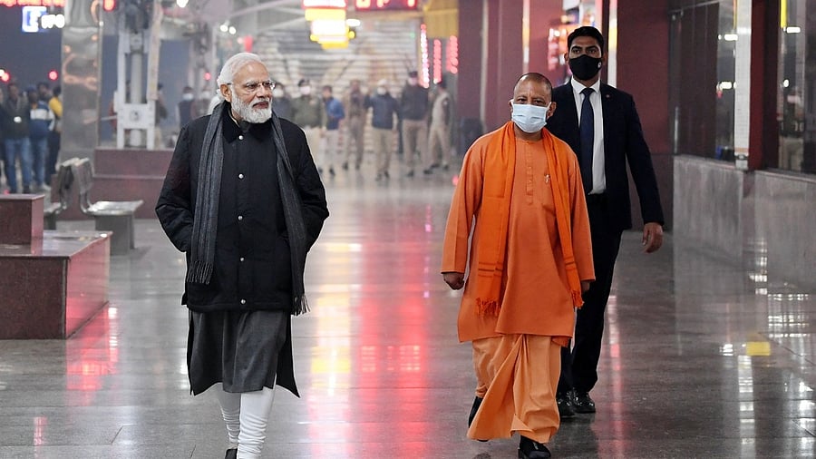 Prime Minister Narendra Modi (L) with Uttar Pradesh CM Yogi Adityanath. Credit: IANS File Photo