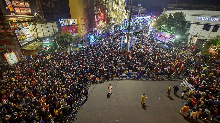 People gather at Park Street to celebrate Christmas day in Kolkata. Credit: PTI File Photo