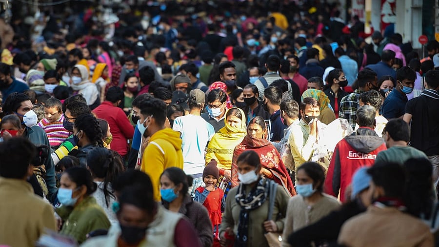 People visit a crowded Sarojini Nagar Market, open on odd-even system as per guidelines set by the Delhi government, in New Delhi. Credit: PTI Photo