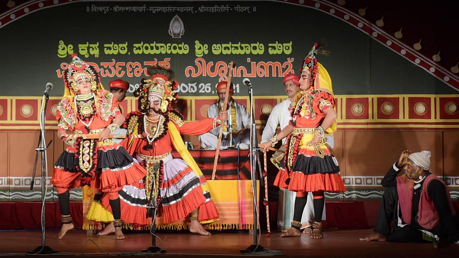 Selected artistes from Kateel Sri Durgaparameshwari Kripaposhitha Yakshagana Mandali perform Yakshagana as a part of cultural programmes held on account of Vishwarpanam at Rajangann in Krishna Mutt in Udupi. Credit: DH Photo
