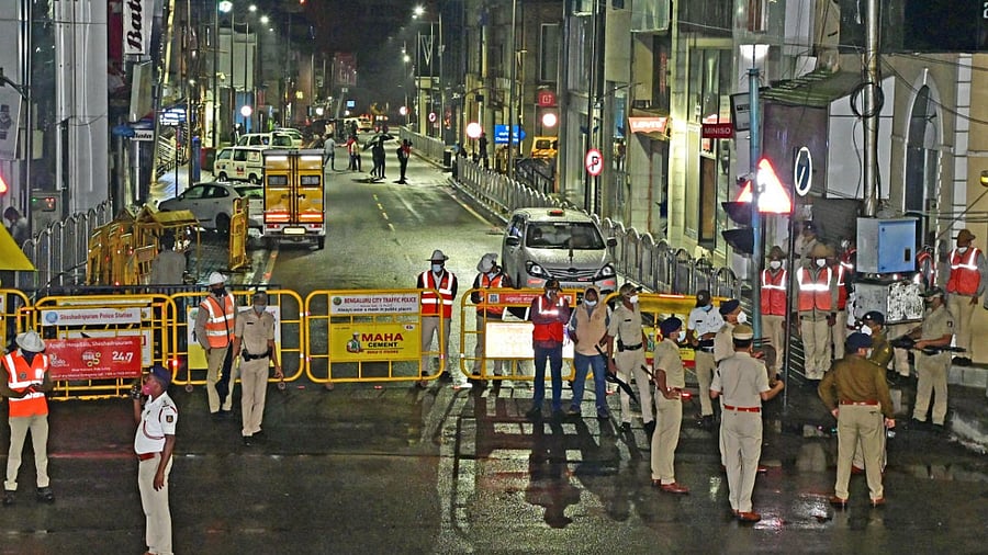 A large number of police personnel were deployed at Brigade Road on Friday night. Credit: DH Photo/Ranju P