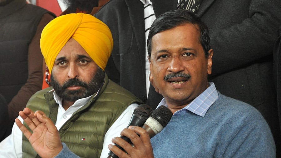 Delhi Chief Minister Arvind Kejriwal with Punjab AAP President Bhagwant Mann. Credit: PTI Photo