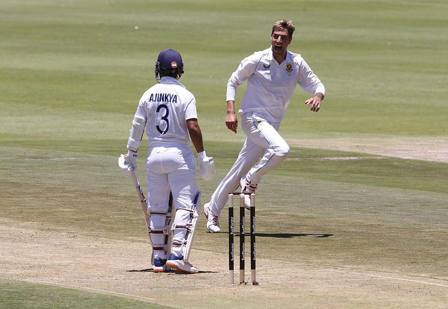 South Africa's Duanne Olivier celebrates after taking the wicket of India's Ajinkya Rahane. Credit: Reuters Photo