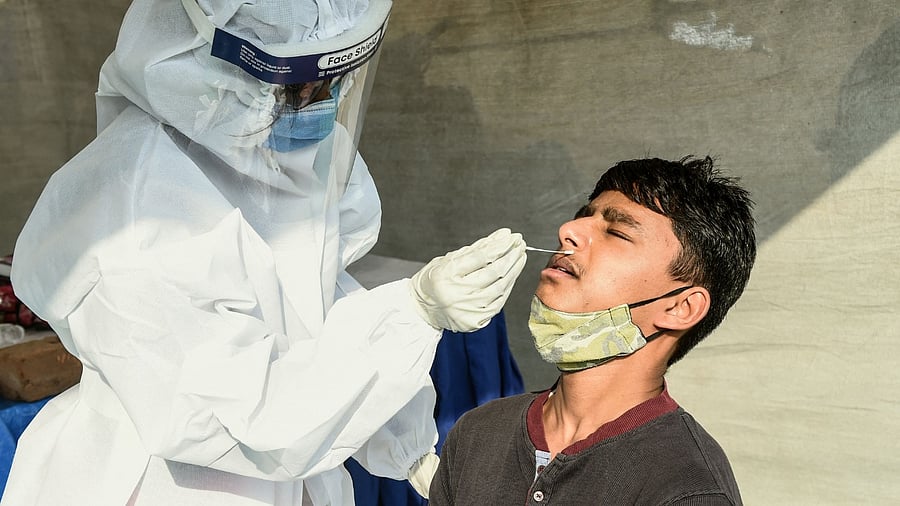 The positivity rate across the state is reported to be a little over 2 per cent with Ahmedabad city the worst affected region with a TPR of 7 per cent. Credit: AFP File Photo