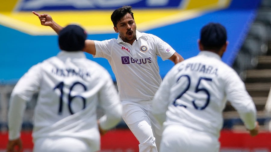 India's Shardul Thakur (C) celebrates after the dismissal of South Africa's Dean Elgar (not seen) during the second day of the second Test at The Wanderers Stadium in Johannesburg. Credit: AFP Photo