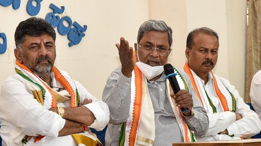 PM Narendra Modi and Home Minister Amit Shah held events, violating restrictions. Did participants there wear masks? Siddaramaiah asked. Credit: DH Photo