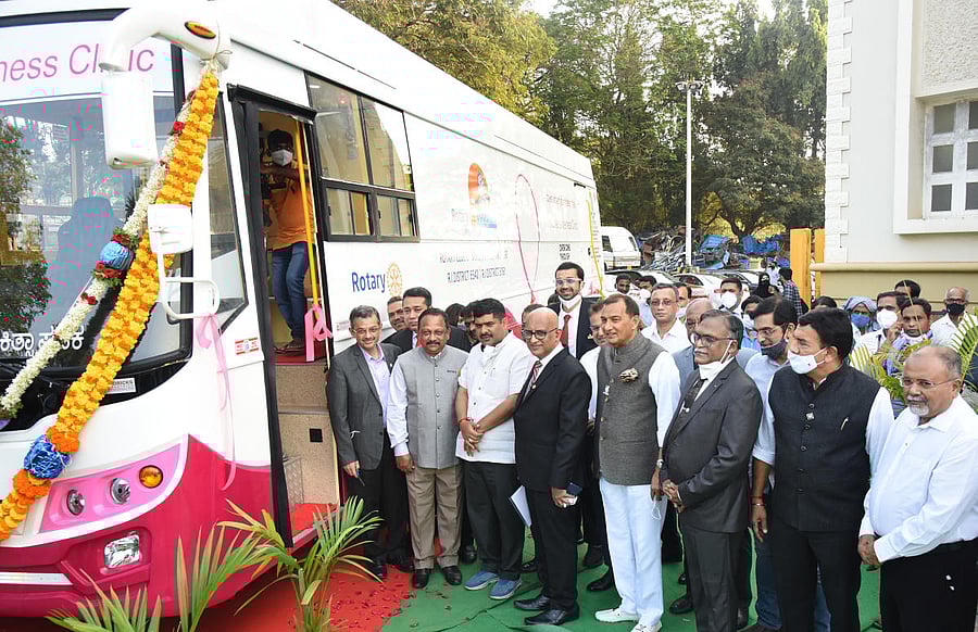 Rotary Club of Mangaluru President Sudhir Kumar Jalan symbolically handed over the Women Wellness Mobile Clinic to Yenepoya (Deemed to be University) Chancellor Yenepoya Abdulla Kunhi at an event in Mangaluru on Wednesday.