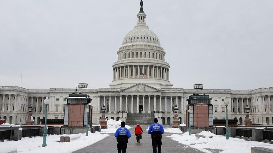 US Capitol Police Officers patrol the East Front Plaza on the eve of the first anniversary of the January 6, 2021 attack on the Capitol in Washington, US. Credit: Reuters Photo
