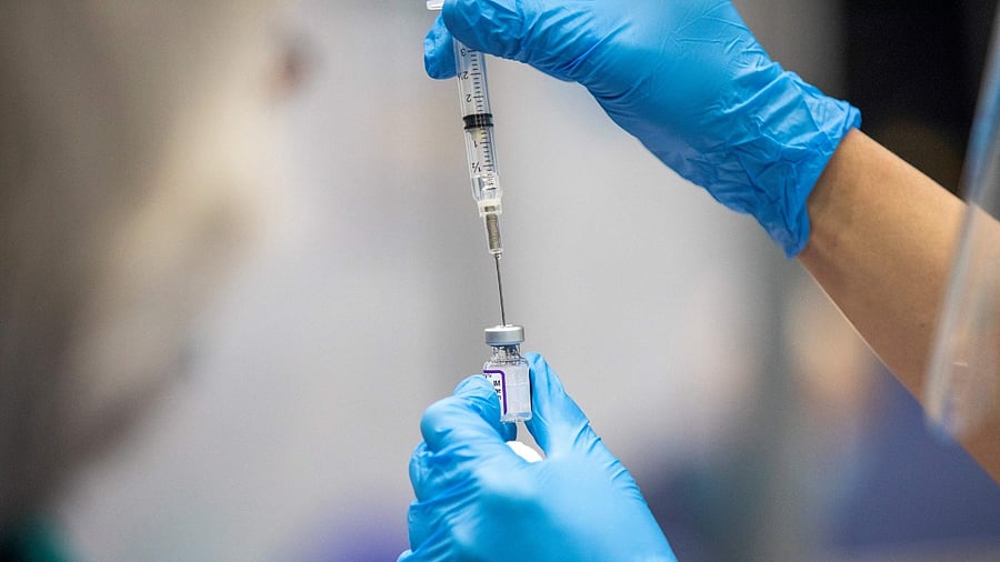 Whilst with a booster shot, the duration of protection against severe disease remains high, protection against mild symptomatic infection is more short-lived and drops to around 30 per cent by about three months. Credit: AFP Photo