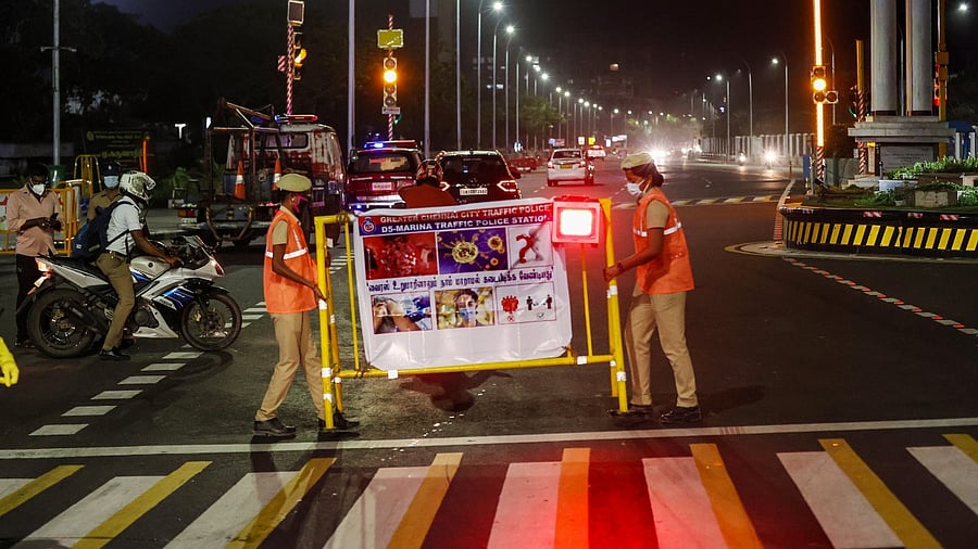 Police set up barricades for checks in Chennai. Credit: PTI Photo
