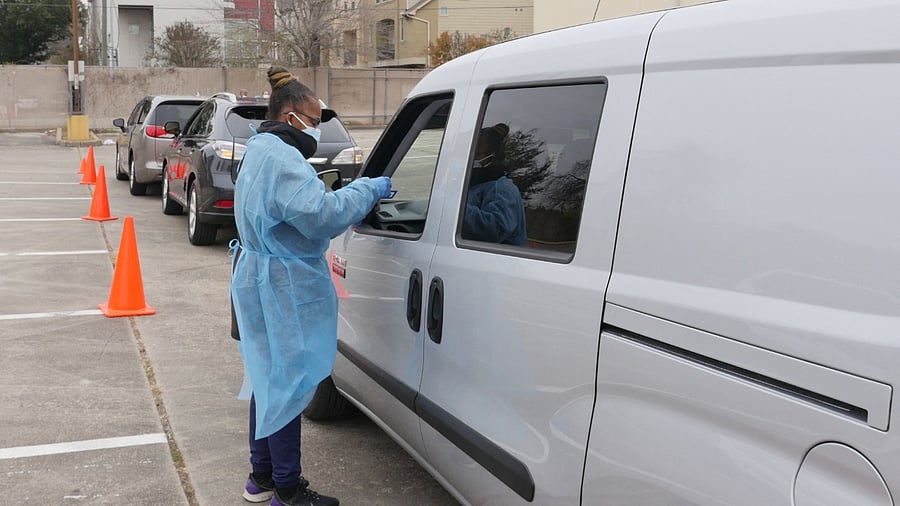 Long queue of vehicles at a testing centre. Credit: AFP Photo