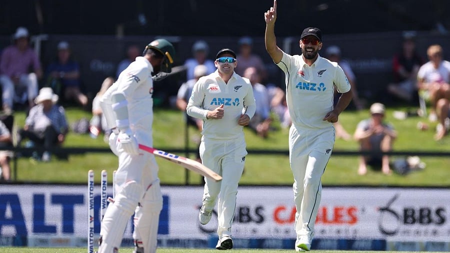 New Zealand's Daryl Mitchell (R) celebrates the wicket of Bangladesh's Mohammad Naim on day two of the second cricket test match between New Zealand and Bangladesh in Christchurch. Credit: AFP Photo