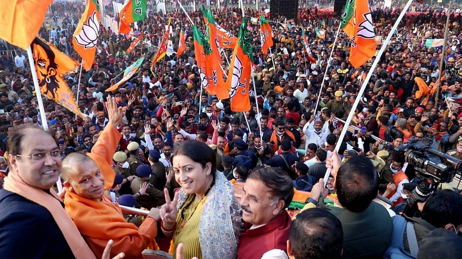 Union Minister Smriti Irani with Uttar Pradesh Chief Minister Yogi Adityanath and other dignitaries, during the 'Jan Vishwas Yatra' ahead of the upcoming Uttar Pradesh Assembly elections, in Amethi, Monday, January 3, 2022. Credit: PTI File Photo
