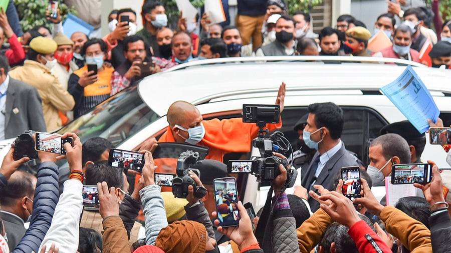 Uttar Pradesh Chief Minister Yogi Adityanath waves towards supporters. Credit: PTI Photo
