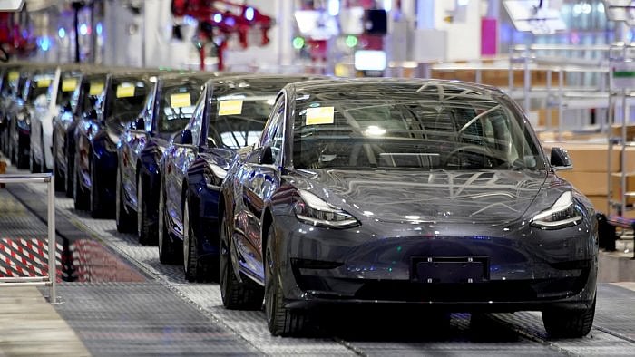 When Tesla couldn’t get the chips it had counted on, it took the ones that were available and rewrote the software that operated them to suit its needs. Credit: Reuters Photo 