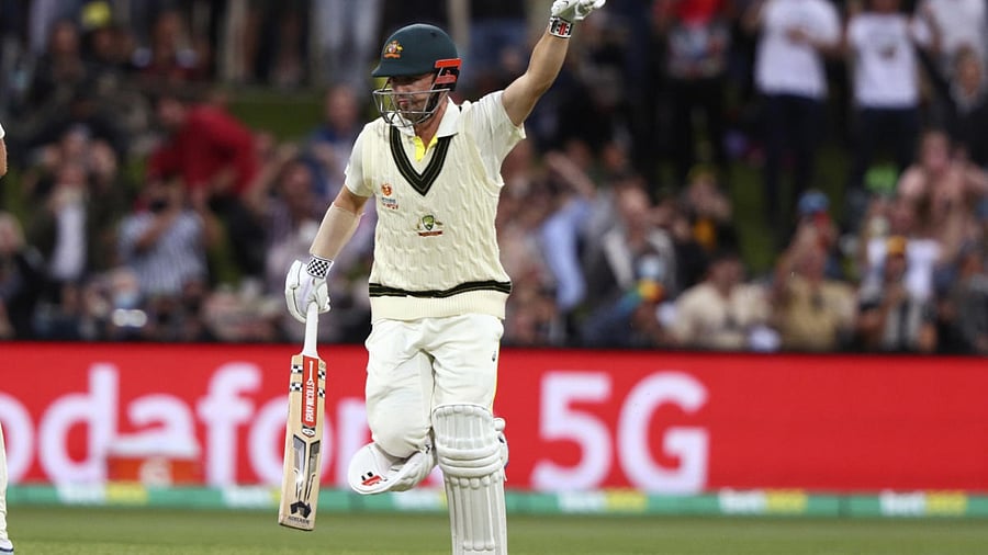 Australia's Travis Head celebrates making 100 runs against England during their Ashes cricket test match in Hobart. Credit: AP/PTI photo
