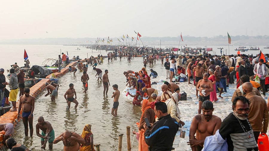 On Friday, around 6.5 lakh people took a holy dip in the river in Prayagraj on the occasion of Makar Sankranti. Credit: PTI Photo