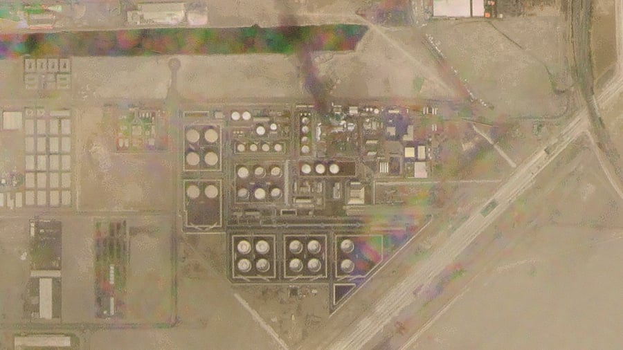 Satellite image provided by Planet Labs PBC, smoke rises over an Abu Dhabi National Oil Co. fuel depot in the Mussafah neighborhood of Abu Dhabi. Credit: AP Photo