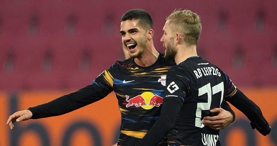 Leipzig's Austrian midfielder Konrad Laimer (R) and Leipzig's Portuguese striker Andre Silva (L). Credit: AFP Photo