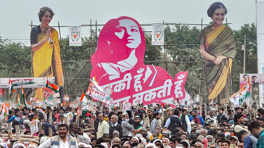 Cut-outs of Priyanka Gandhi Vadra and Indira Gandhi flank cut-out of Maurya, the face of the 'ladki hoon lad sakti hoon' campaign. Credit: PTI Photo