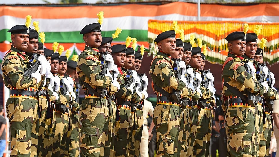 Border Security Force (BSF) personnel take out a procession during the Republic Day celebrations at the Manekshaw Parade Ground on Wednesday. Credit: DH Photo/Ranju P