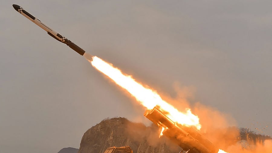 This picture shows what North Korea says is a long-range cruise missile test-fire conducted by the Academy of Defence Science of the DPRK at an undisclosed location. Credit: AFP Photo/KCNA via KNS