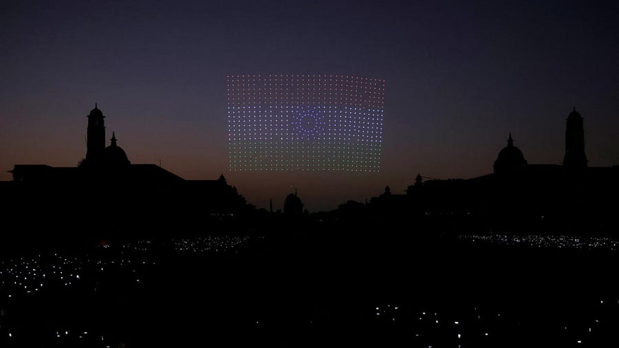 Drones form a shape of the Indian flag during the Beating the Retreat ceremony in New Delhi, India. Credit: Reuters Photo