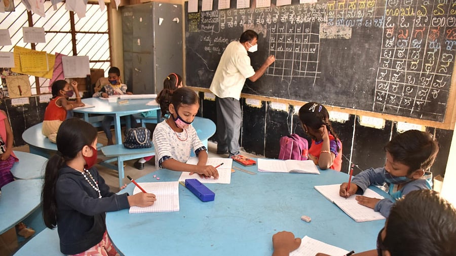 Offline classes resume at this government school in Nagashetty Halli on Monday. Credit: DH Photo/B K Janardhan