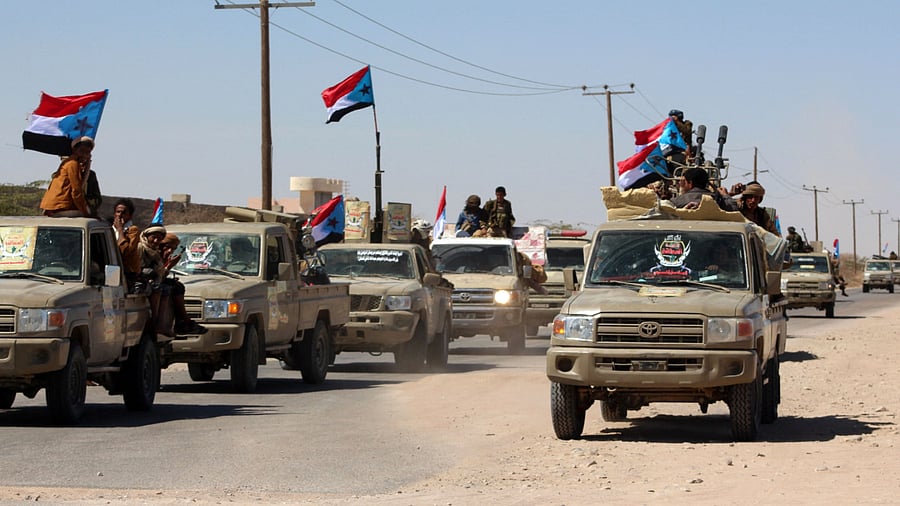 Yemeni pro-government fighters from the UAE-trained Giants Brigade, gather on the outskirts of Ataq city, east of the Red Sea port of Aden, on their way to the frontline facing pro-Iran Huthi fighters. Credit: AFP Photo
