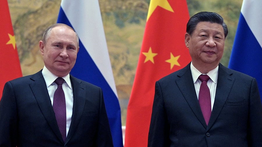 The two strongmen will attend the Olympic opening ceremony later in the evening. Credit: AFP Photo