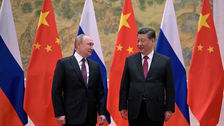 Russian President Vladimir Putin attends a meeting with Chinese President Xi Jinping in Beijing. Credit: Reuters Photo
