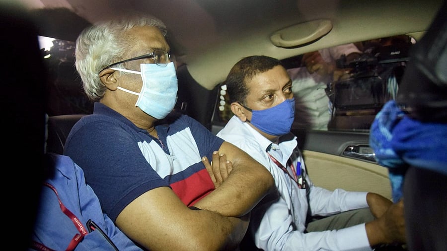 Suspended IAS officer M Sivasankar being taken to ACJM special court in connection to the Kerala gold smuggling case. Credit: PTI File Photo