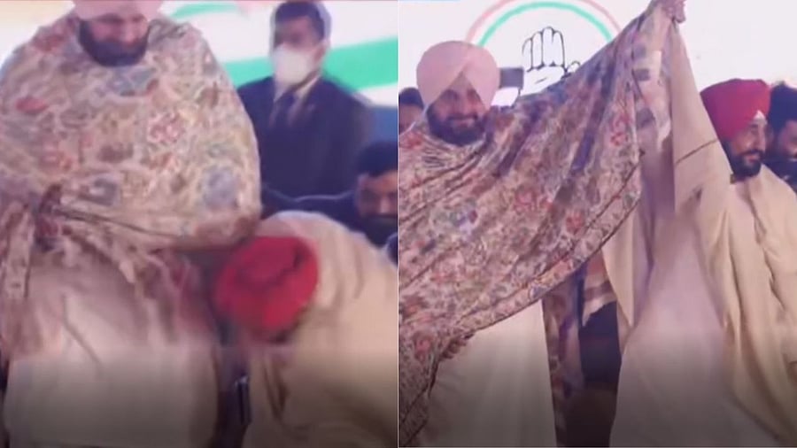 Sidhu rose from his seat, held Channi’s hand and raised it in a rare show of unity. Credit: ANI Video Screengrab