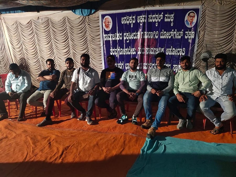 Asif Apathbhandava stages dharna on Tuesday.