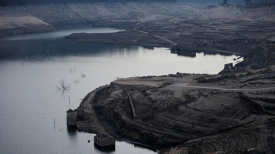 A general view shows the ancient village of Aceredo that had been submerged by Limia river in the 1990s after the dam was built in Concello de Lobios, Spain. Credit: Reuters Photo