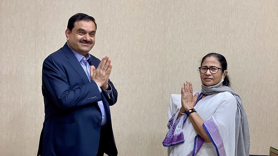 File Photo of Gautam Adani and West Bengal CM Mamata Banerjee. Credit: Twitter/@gautam_adani