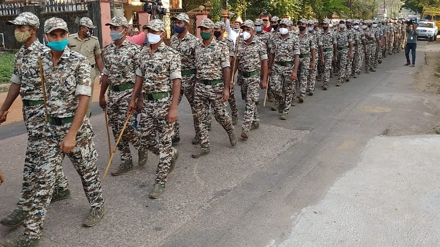 Forces hold a flag march in Udupi over the weekend. Credit: DH Photo