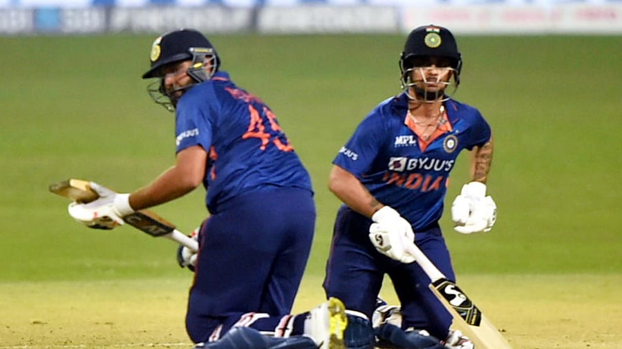 Indian batsmen Rohit Sharma and Ishan Kishan run between the wickets, during the first T20 cricket match between India and West Indies, at Eden Gardens in Kolkata, Wednesday, Feb. 16, 2022. Credit: PTI Photo