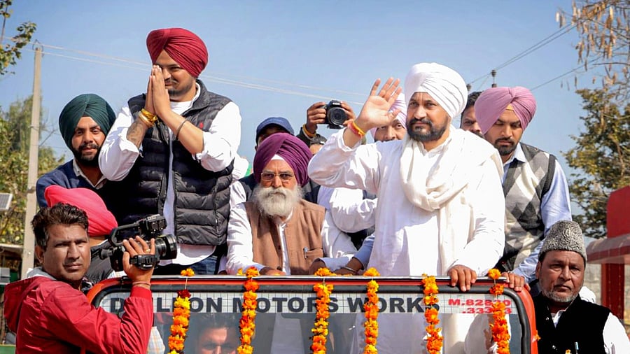Punjab Chief Minister Charanjit Singh Channi and Congress candidate Sidhu Moosewala. Credit: PTI Photo