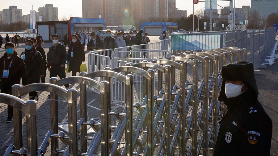 People arrive to the National Stadium, also known as the Bird's Nest, before the closing ceremony of the Beijing 2022 Winter Olympics, in Beijing, China February 20, 2022. Credit: Reuters Photo