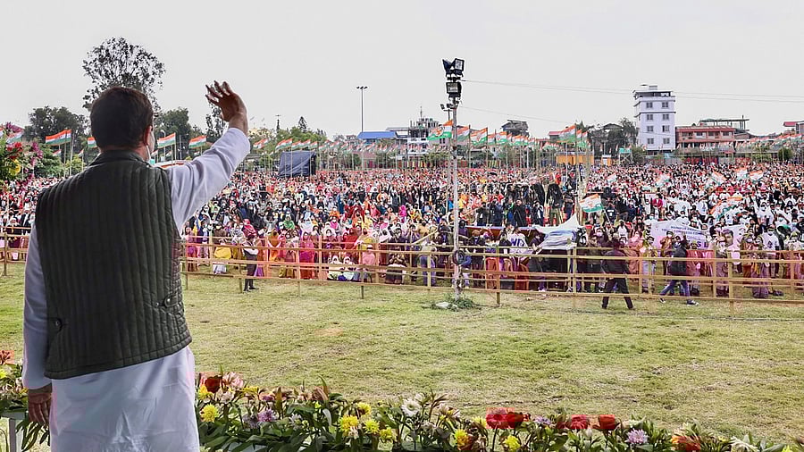 Rahul Gandhi waves at supporters during a rally in Manipur. Credit: PTI Photo